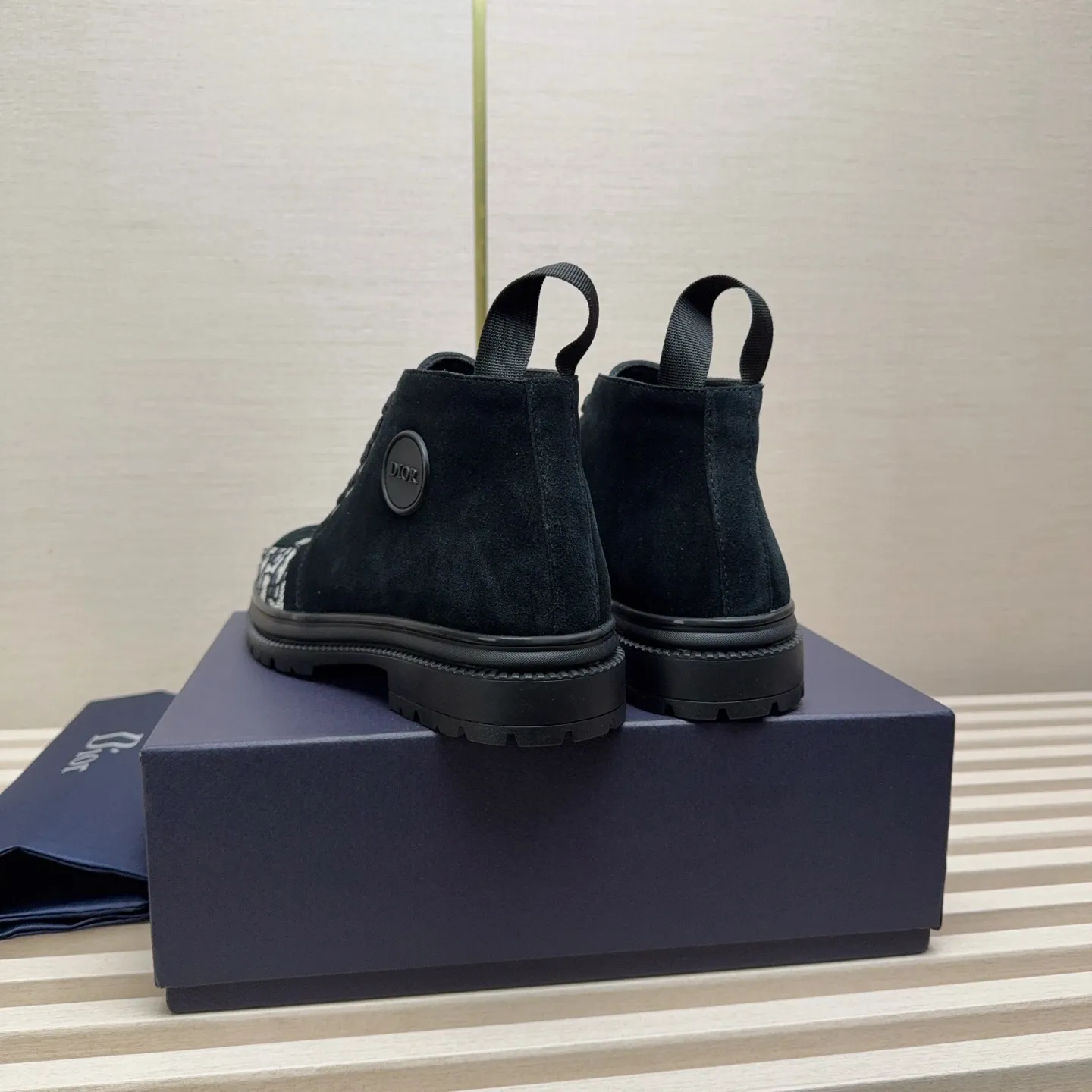 Men's Shoes 💰440 Dior A practical choice that combines protection with classic style. Made from durable Rugged Calf leather, it's tumbled and hand-finished to create a soft suede feel with a rich texture. Elastic side panels and subtle cutouts are inspired by the classic Chelsea boot. Leather upper and lining with Kummel tabs at front and rear, rubber outsole